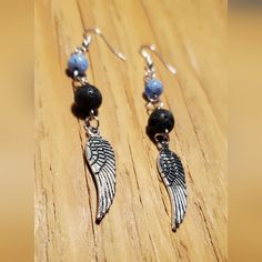 3½ Inch Long Angel Wing Charm Aromatherapy Earrings. These Beautiful Earrings Are Hand Crafted On Silver Tone Metal Findings With Black Lava Beads And Blue Glass Beads Finished With Silvertone Metal Angel Wing Charms. $12.00 +S&H #Countrygypsyor Diy Earrings Easy, Angel Earrings, Angel Wing Earrings, Lava Beads, Wing Earrings, Lava Bead, Diy Earrings, Angel Wings, Blue Glass