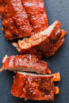 sliced meat on a cutting board with marinara sauce