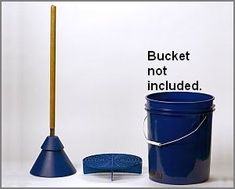 a bucket with a wooden handle next to a mop and plunger on a white surface