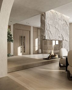 a modern living room with stone fireplace and white furniture