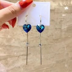 Add A Touch Of Elegance To Your Look With These Stunning Women's Blue Crystal Love Heart Long Tassel Dangle Drop Earrings. The Earrings Feature A Beautiful Heart-Shaped Blue Crystal With A Tassel Attached To It, Providing A Unique And Stylish Look. Perfect For Any Occasion, These Earrings Will Add A Pop Of Color To Any Outfit And Make A Statement. Material: High Quality Alloy/Zircon/Crystal Size3.46"X0.55" Valentine's Day Blue Heart Earrings, Elegant Blue Heart Earrings For Pierced Ears, Blue Heart Earrings For Gift, Blue Heart Earrings For Party, Trendy Blue Tassel Drop Earrings, Blue Elegant Heart Earrings For Pierced Ears, Elegant Blue Earrings For Valentine's Day, Elegant Blue Tassel Earrings, Blue Heart-shaped Earrings For Party