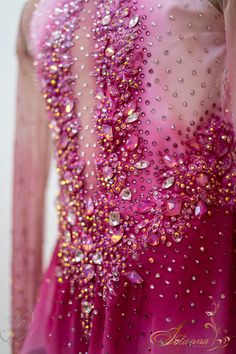 the back of a dress with sequins on it