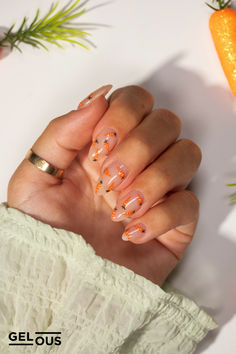 Gelous Mini Carrots gel nail polish art - photographed on model Carrot Nail Art, Citrus Gel Nails, Mini Egg Nails, Bunny And Carrot Nails, Mini Egg Nails Easter, Mini Eggs Nails, Nail Polish Tutorial, Gel Manicure Designs