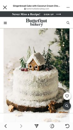 a white cake sitting on top of a wooden board