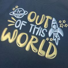 a t - shirt that says out of this world with an image of a rocket and stars