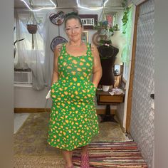 Tabitha Brown Green Orange & Yellow Floral Midi Dress Size Xxsmall Pre-Loved! Approximate Measurements, Flaws (If Any) & Fabric Tag All Shown In Photos. Model :Me 5ft 2in 149 Lbs Measure H:39in W:32in C:34in / Average Size 6/8 / Small / Shoe Size 7.5 Smoke Free Home. All Items Are 100% Authentic And Ship Next Day From Sunny Florida. Offers / Counter Offers Always Welcome!! *** Feel Free To Comment Or Message Me With Any Questions. *** I Will Accept Or Counter My Lowest. Bundles Always Get A Disc Orange Cotton Midi Sundress, Orange Fitted Midi Sundress, Fitted Orange Cotton Midi Dress, Yellow Cotton Knee-length Sundress, Tabitha Brown, Fabric Tags, Brown Dress, Floral Midi Dress, Green Orange