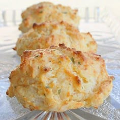 two biscuits sitting on top of a glass plate