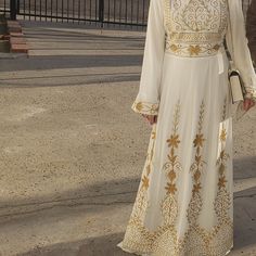 Beautiful White And Gold Kaftan/Arabic Thobe Dress Perfect For An Engagement, Katb Kitab/Nikah Ceremony Or Even Eid. Features Some Beautiful Gold Embroidery All Over The Dress. Absolutely Stunning And Only Worn Once. In Perfect Condition! Size Can Fit Medium/Large (6-10). Free Shipping! Elegant Evening Dress With Dabka Detail, Elegant Evening Dress With Dabka Embroidery, Festive White Floor-length Maxi Dress, Floor-length Cream Dress For Eid, Cream Floor-length Dress For Eid, White Floor-length Abaya, White Fitted Thobe For Wedding, Long White Festive Dress, Fitted White Thobe For Wedding