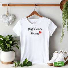 Celebrate the unbreakable bond of friendship with this charming Best Friends T-shirt.  Crafted from soft and breathable cotton, this tee is as comfortable as it is stylish. The vibrant colours and playful design make it a fun and trendy addition to any casual outfit.  Whether you're enjoying a day out with your bestie or looking for a thoughtful gift, this t-shirt is a perfect choice. Let your shirt reflect the special connection you share with your best friend, a symbol of joy and companionship Summer Gift T-shirt With Text Print, Casual Tops With Funny Text For Gifts, Summer Text Print T-shirt For Gift, White T-shirt For Mother's Day Gift, White Summer T-shirt For Gifts, White Summer T-shirt For Gift, White Summer T-shirt Gift, Mother's Day Gift T-shirt, Summer Slogan Top As Gift