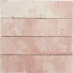 pink marble tiles are arranged on top of each other