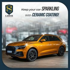 an orange audi q3 parked in front of a building with the words keep your car sparkling with ceramic coating