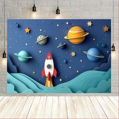 this is an image of a space themed wall mural in a room with wood flooring