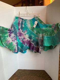 Beautiful tie dyed skirt Hippie Ruffled Skirt Bottoms For Spring, Fitted Tie Dye Bottoms For Spring, Hippie Cotton Mini Skirt For Spring, Fitted Bohemian Tie-dye Skirt, Fitted Bohemian Tie Dye Skirt, Fitted Tie Dye Bohemian Skirt, Hippie Style Lined Wrap Skirt For Spring, Hippie Lined Wrap Skirt For Spring, Hippie Style Asymmetrical Skirt For Spring