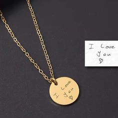 Handwritten Engraved Necklace, Unique Handwritten Necklace, Delicate Dainty Jewelry, Meaningful Personalized Gift for Her, Custom Handwriting Keepsake Necklace, Sentimental Memorial Jewelry, Sweet Gift Ideas, Mother's Day Gifts Capture your most cherished memories with our Handwritten Engraved Necklace, a Memorial Sentimental Personalized Handwriting Jewelry piece. This Cute Dainty Gift for Her is a unique way to preserve special moments. Perfect for birthdays, holidays, or any occasion! Shop no Mother's Day Round Metal Charm Necklaces, Personalized Round Metal Chain Necklace, Personalized Gift Round Clavicle Chain Necklace, Personalized Gift Clavicle Chain Necklace, Metal Circle Chain Necklace For Gift, Personalized Round Chain Necklace For Gift, Personalized Round Chain Necklace Gift, Valentine's Day Engraved Metal Necklace, Handwriting Keepsake