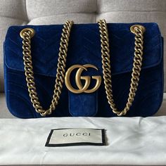 Gucci Gg Marmont Flap Bag Matelasse Velvet In Cobalt Blue Small Size. This Is Not A Mini. / Rare In This Condition /New Sizing 10” W X 6” H X 3” D ( 12” Or 22” Strap Drop) It Is A Gorgeous Cobalt Blue Color And Some Lights It Looks Blue And Some Lights It Might Look Black. Comes With Dust Bag. New, Never Worn, No Odor, Beautiful Bag. Blue Gucci Shoulder Bag With Branded Hardware, Classic Blue Gucci Shoulder Bag, Blue Gucci Shoulder Bag With Dust Bag, Designer Blue Shoulder Bag With Gold-tone Hardware, Blue Gucci Shoulder Bag For Formal Occasions, Luxury Blue Gucci Bags, Blue Gucci Bag For Formal Occasions, Formal Blue Gucci Shoulder Bag, Formal Blue Gucci Bag