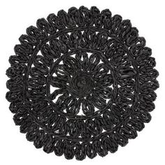 a black circular rug with an intricate design on the center and bottom, made out of rope