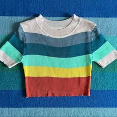 Nwot Super Cute Crop Top Sweater With Bold Rainbow Stripes. Size Small. See Photos For Measurements. Pet-Free, Smoke Free Home, And I Am The Only Owner Of This Item. Great Gift, Too! Casual Yellow Tops With Colorful Pattern, Multicolor Tops With Color Matching For Summer, Multicolor Tops With Color Matching For Spring, Retro Multicolor Tops With Rainbow Print, Retro Multicolor Rainbow Print Top, Spring Ribbed Multicolor Tops, Trendy Color Block Tops, Colorful Fitted Color Block Top, Trendy Yellow Color Block Tops