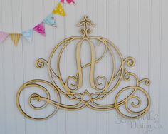 a metal wall hanging with a crown on it