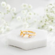 The Eden ring is inspired by the Garden of Eden in the Bible. It is a symbol of the natural beauty, purity, and paradise that is reflected throughout the journey of motherhood. Nature-inspired Open Ring For Anniversary, Nature-inspired White Promise Ring, White Nature-inspired Promise Ring, White Sterling Silver Nature-inspired Rings, Ethereal Yellow Gold Rings For Gift, Nature-inspired Stackable Rings For Gifts, Ethereal Yellow Gold Rings For Gifts, Ethereal Style Yellow Gold Rings For Gifts, Nature-inspired White Sterling Silver Rings