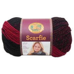 a red and black ball of yarn with the label scarrif on it's side