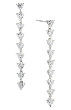 A line of faceted cubic zirconia illuminates these stunning drop earrings that are hand-polished to an exquisite shine. 2" drop; 1/4" width Post back Rhodium plate or 18k-gold plate/cubic zirconia Imported Formal Long Drop Diamond Linear Earrings, Classic Drop Linear Earrings With Diamond Accents, Cubic Zirconia Diamond Cut Drop Earrings, Diamond Cut Cubic Zirconia Linear Drop Earrings, Classic Linear Earrings With Diamond Accents, Classic Long Drop Linear Earrings With Diamond Accents, Formal Drop Linear Earrings With Diamond Accents, Anniversary Long Drop Diamond Earrings, Classic Cubic Zirconia Long Drop Linear Earrings