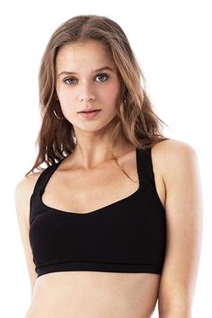 GINA BRA has a basic cross back cut with thick straps and a slight heart shaped neck at the front.  The fabric is a soft touch quality with high flexibility and as much recovery.  You will feel very comfortable and safe in each time you sweat in this garment. It never loses shape.  GINA BRA has removable paddings inside. It does not reveal the skin texture. For detailed information, please view our size guide.   PRODUCT FEATURES Soft and light touch on the skin Heart shaped neckline Fabric has h Medium Support Sports Bra With Crisscross Straps, Casual Black Sports Bra For Everyday, Bra Friendly Cross Back Tank Top, Fitted Sports Bra With Medium Bust Support For Everyday, Seamless Sports Bra With Strappy Back, Casual Seamless Sports Bra With Strappy Back, Everyday Solid Scoop Neck Sports Bra, Everyday Sports Bra With Tank Straps, Solid Color Sleeveless Sports Bra For Everyday