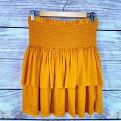 Anthropologie Monday Tuesday Wednesday Thursday Friday Saturday Sunday Bailee Smocked Mini Skirt. Nwt. This Smocked Mini Skirt Puts A Feminine Spin On Everyday Outfitting. Multi Purpose Piece, Can Wear As A Botton Or A Top. Super Soft, Comfortable, Flattering And Flowey. Vibrant Beautiful Yellow. Size M. True To Size Polyester, Rayon, Spandex Smocked Waist Mini Silhouette Pull-On Styling Machine Wash Measurements Available Upon Request. Casual Cotton Skirt With Smocked Back, Casual Tiered Skirt With Smocked Back, Fitted Bottoms With Smocked Bodice, Mini Length, Cotton Tiered Skirt With Smocked Bodice, Fitted Mini Bottoms With Smocked Bodice, Cotton Mini Skirt With Smocked Bodice, Casual Mini Skirt With Smocked Bodice And Flowy Fit, Casual Skirt With Smocked Bodice, Brunch Skirt With Smocked Back