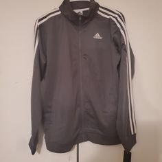 Grey Adidas Jacket Xl 18/20 Outdoor Sportswear Casual Adidas Long Sleeve Track Jacket With Ribbed Cuffs, Gray Long Sleeve Sportswear Outerwear, Adidas Long Sleeve Winter Track Jacket, Adidas Winter Track Jacket Long Sleeve, Adidas Cotton Outerwear With Ribbed Cuffs, Adidas Long Sleeve Outerwear With Ribbed Cuffs, Adidas Grey, Outdoor Sportswear, Grey Jacket