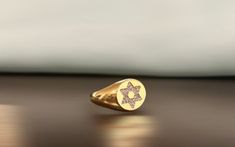 Show your faith with this exquisitely crafted Men's and Women's Signet ring, featuring the Star Of David a symbol of Judaism representing unity, protection, and connection to the divine.  Handcrafted with meticulous attention to detail, this ring blends timeless tradition with contemporary style. Material: Solid Gold 10K,14K Ring Size: Available From Size 6US Till 16US Band Width: 2.8mm Stone Type: Diamond Stone Clarity: Si1 Stone Shape: Round Stone Count: 30 Stone Size: 1.25MM Total Stone Weigh Star Of David Jewelry Polished Finish For Anniversary, Star Of David Polished Jewelry For Anniversary, Star-shaped Engraved Rings For Anniversary, 14k Gold Star Shaped Signet Ring With Polished Finish, Star-shaped Polished Signet Ring For Anniversary, Star-shaped Polished Finish Signet Ring For Anniversary, Star-shaped Signet Ring With Polished Finish For Anniversary, Star Shaped Signet Ring With Polished Finish For Anniversary, Star-shaped Signet Ring In 14k Gold For Anniversary