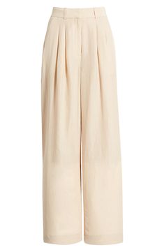 Add casual polish in linen-kissed pants tailored with neat pleats and flowy wide legs for a touch of comfort. Zip fly with hook-and-bar closure 45% cupro, 28% linen, 27% lyocell Machine wash, line dry Imported Chic Pleated Wide-leg Bottoms, Cotton Wide-leg Pleated Pants, Beige Pleated Wide-leg Pants, Beige Cotton Wide Leg Full-length Pants, Beige Wide-leg Pants With Elastic Waistband, Beige Beach, Pleated Wide Leg Pants, Pants Tailored, Wide Legs