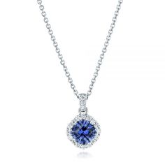 102740 14k White Gold Pendant   Blue Sapphire Fine quality- 2.07 ctw   19 Diamonds - .42 ctw   Clarity: VS2 - Color: F-G   Joseph Jewelry. This stunning pendant features a radiant cut blue sapphire surrounded by a diamond halo, with additional diamond accents on the bail. It was created for a client from La Canada Flintridge, CA, who asked us to design a beautiful new setting for his existing sapphire. We communicated with him online to finalize the details of the piece, and after a few rounds o Classic Blue Round Diamond Necklace, Blue Gia Certified Round Cut Jewelry, Blue Diamond Cut Necklace In Fine Jewelry Style, Blue Diamond Cut Fine Jewelry Necklace, Classic Blue Diamond Necklace With Diamond Cut, Blue Diamond Necklace With Prong Setting, Blue Diamond Necklace For Anniversary, Blue Diamond Necklace With Diamond Accents, Blue Diamond Necklace Brilliant Cut For Anniversary