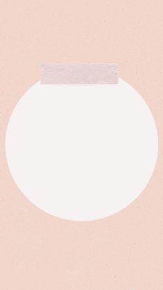 a white circle with a piece of paper sticking out of it's center on a pink background