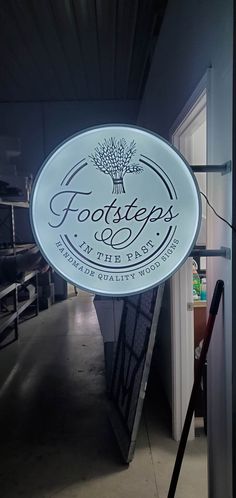 a sign that says foot steps on the side of a building