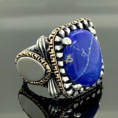 Lapis Signet Ring, Lapis Lazuli Men Ring,Men Handmade Ring , Sterling Silver, Blue Lapis-Lazuli Gemstone,Man Jewelry,Gift For Him Made of 925 Sterling Silver. Sent in a Special Jewelry Box. ★Item Details * Gender : Male / Female * Material : 925K Sterling Silver * Total weight : 25 Grams * Gemstone : Lapis Lazuli Stone * Stone Size 15x20mm ✔ Ready to Ship in 1-2 Business Days .. ✔ Shipped to the Worldwide 1-5 business days with free shipping... ✔ The product will be sent to you with a handmade w Adjustable Blue Ring With Gemstone Accents, Blue Bohemian Jewelry With Accent Stones, Adjustable Blue Rings With Large Stone, Adjustable Blue Rings With Accent Stones, Handmade Adjustable Lapis Lazuli Rings, Handmade Lapis Lazuli Ring, Blue Large Stone Ring Jewelry, Adjustable Blue Jewelry With Accent Stones, Blue Stone Setting Ring Jewelry