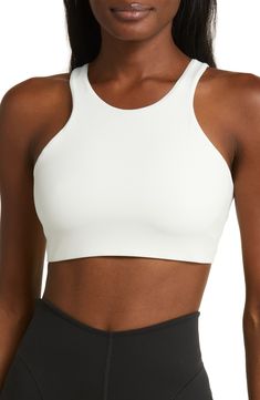 Get into your groove in this ultracomfy sports bra with signature Dri-FIT tech and a breezy back cutout to keep you cool and dry. Racerback Dri-FIT moisture-wicking technology Lined 80% polyester, 20% elastane Machine wash, line dry Imported Nike Sports Bra With Built-in Bra For Training, Nike Sports Bra With Built-in Bra For Yoga, Nike Yoga Sports Bra With Built-in Bra, White Cropped Seamless Sports Bra, Cropped Moisture-wicking Sports Bra For Light Exercise, Nike Seamless Sports Bra For Training, High Stretch Seamless White Sports Bra, Breathable Compressive Cropped Sports Bra, Breathable Cropped Sports Bra For Workout