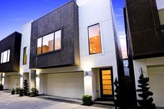 two story houses with white and black sidings