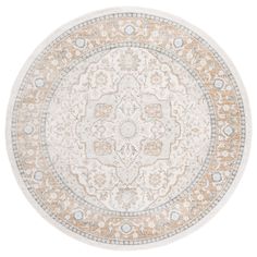 a round rug with an ornate design on the center and sides in beige, white and tan