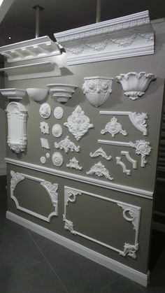 an assortment of architectural details on display in a museum