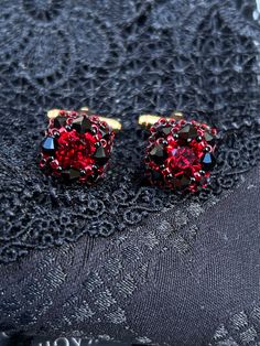 Whatever you wear them at special occasions or just to add a dash of uniqueness to your office outfit , you can't go wrong with this lovely handmade cufflinks . They are carefully crafted with Serenity and Swarovski crystals , gold plated bar and Japanese seed beads . The approximate measurements of cufflinks is 1x1 centimetres. Elegant Red Cufflinks For Formal Occasions, Classic Cuff Jewelry For Party, Elegant Clip-on Cufflinks For Gift, Luxury Red Clip-on Earrings As Gift, Handmade Red Cuff Jewelry, Elegant Beaded Cuff Jewelry, Elegant Beaded Clip-on Earrings For Formal Occasions, Elegant Adjustable Cufflinks As A Gift, Party Cuff Beaded Jewelry