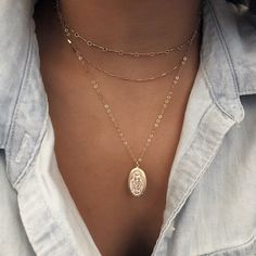 This dainty gold Virgin Mary necklace is a classic addition to your layering necklaces. This minimalist necklace is also perfect by itself. Timeless and easy. Very simple and perfect for every outfit. . . . . . . . . . . . . . . . . . . . . . . . . . . . . . . . . . . . . . . . . . . Details: ♥ Virgin Mary charm: 12x21mm ♥Tarnish resistant ♥ Safe for sensitive skin. All components are 14k gold filled. Delicate, High quality Italian or USA components. Comes in a beautiful box ready for gift givin Gold Virgin Mary Necklace, Pendant Necklace Long, Mary Necklace, Virgin Mary Necklace, Valentine Gift For Wife, Long Pendant Necklace, Necklace Long, Minimalist Necklace, Gold Filled Jewelry