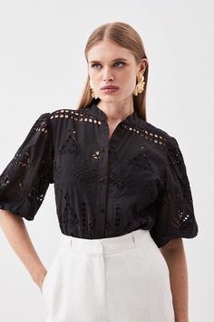 The Bohemian Essence Of The Intricate Embroidery That Creates The Yoke Of This High-Neck Top, Offset By The Voluminous Short Sleeves And Draped Length. Made Of Lightweight Cotton, This Piece Can Be Seamlessly Styled With Denim, Linen, And Leather For Versatile Options.High Neckembroideryshort Sleeveslightweight Cotton Guipure Lace Top, Embroidery Top, Latest Tops, High Neck Top, Fitted Blouses, Smart Casual Outfit, Trending Sunglasses, Woven Top, Karen Millen