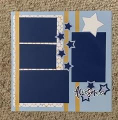 a blue and yellow scrapbook with stars on it