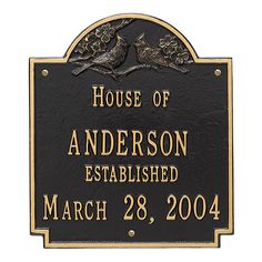 a plaque that reads house of sorenson established march 28, 2003 with two birds on it