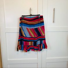 Multicolor Ruffled Skirt Multicolor Ruffled Midi Skirt, Multicolor Ruffle Hem Skirt For Summer, Multicolor Skirt With Ruffle Hem For Summer, Multicolor Tiered Skirt With Ruffle Hem, Multicolor Ruffle Hem Skirt For Spring, Multicolor Asymmetrical Lined Skirt, Chic Multicolor Tiered Skirt Bottoms, Chic Multicolor Asymmetrical Skirt, Multicolor Ruffled Mini Skirt