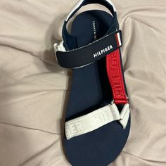 Tommy Hilfiger Women Sandals Nwt Casual White Tommy Hilfiger Sandals, Casual Blue Sport Sandals With Ankle Strap, Casual Blue Ankle Strap Sport Sandals, Tommy Hilfiger Open Toe Sandals For Beach, Tommy Hilfiger Open Toe Sandals For Vacation, Tommy Hilfiger Flat Sandals For Spring, Tommy Hilfiger Synthetic Beach Sandals, Tommy Hilfiger Round Toe Sandals For Vacation, Tommy Hilfiger Sandals With Cushioned Footbed And Round Toe