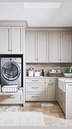 a washer and dryer sitting in a kitchen