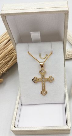 "A fine quality cross in 14K with yellow and white solid gold. It's decorated with 24 pieces of Swarovski stones!(it can also be set with REAL DIAMONDS ) A beautiful cross. Ideal for a present, engagement gift and baptism. ✪ Please check the dimensions to be sure about the size! Cross Pendant Dimensions: Height - 1.18 inches / 3 cm Width - 0,78 inches / 2 cm Thickness - 0,032 inches / 0,80 mm The chain is NOT included in the price. To see the inches and prices of the chains, please click on the Yellow Gold Cross Necklaces For Baptism, White Gold Cross Pendant For First Communion, Yellow Gold Cross Pendant Necklace For Baptism, Yellow Gold Crucifix Necklace For Baptism, White Gold Cross Pendant Necklace For First Communion, Yellow Gold Cross Necklace For Baptism, Gold Cubic Zirconia Cross Necklace, Yellow Gold Baptism Cross Pendant Necklace, White Cross Necklace For Baptism