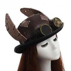 Your imagination has no limit, explore it with this cute and funny Steampunk hat! Material: polyester Gender: unisex Special use: Costumes, cosplay, steampunk events The goggles are included with the hat! Steampunk Costume Accessories With Brimmed Shape, Steampunk Brimmed Costume Accessories For Party, Steampunk Brimmed Costume Accessories For Costume Party, Steampunk Costume Top Hat, Steampunk High Crown Costume Accessories For Cosplay, Steampunk Halloween Costume Accessories, Steampunk Adjustable Hat For Costume Party, Steampunk Adjustable Costume Hats And Headpieces, Adjustable Steampunk Top Hat For Themed Events