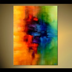 an abstract painting with bright colors and black frame on the wall above it is a framed photo