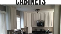 a kitchen with white cabinets and black counter tops is featured in the magazine cabinetrs